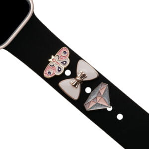 bijoux en forme de papillon, de noeud et de diamant sur bracelet Apple Watch Sport noir